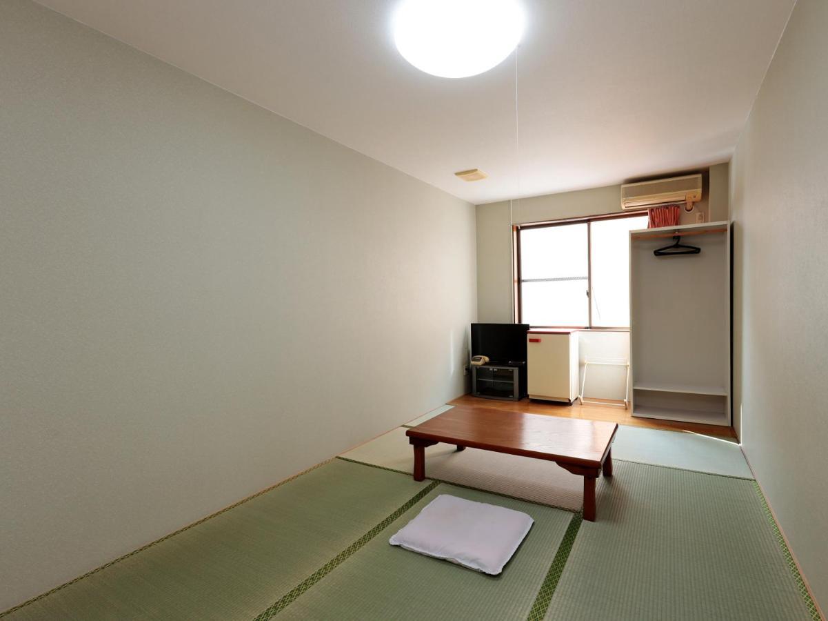 Отель Tabist Izumi Yusen Shukuhaku Center Экстерьер фото