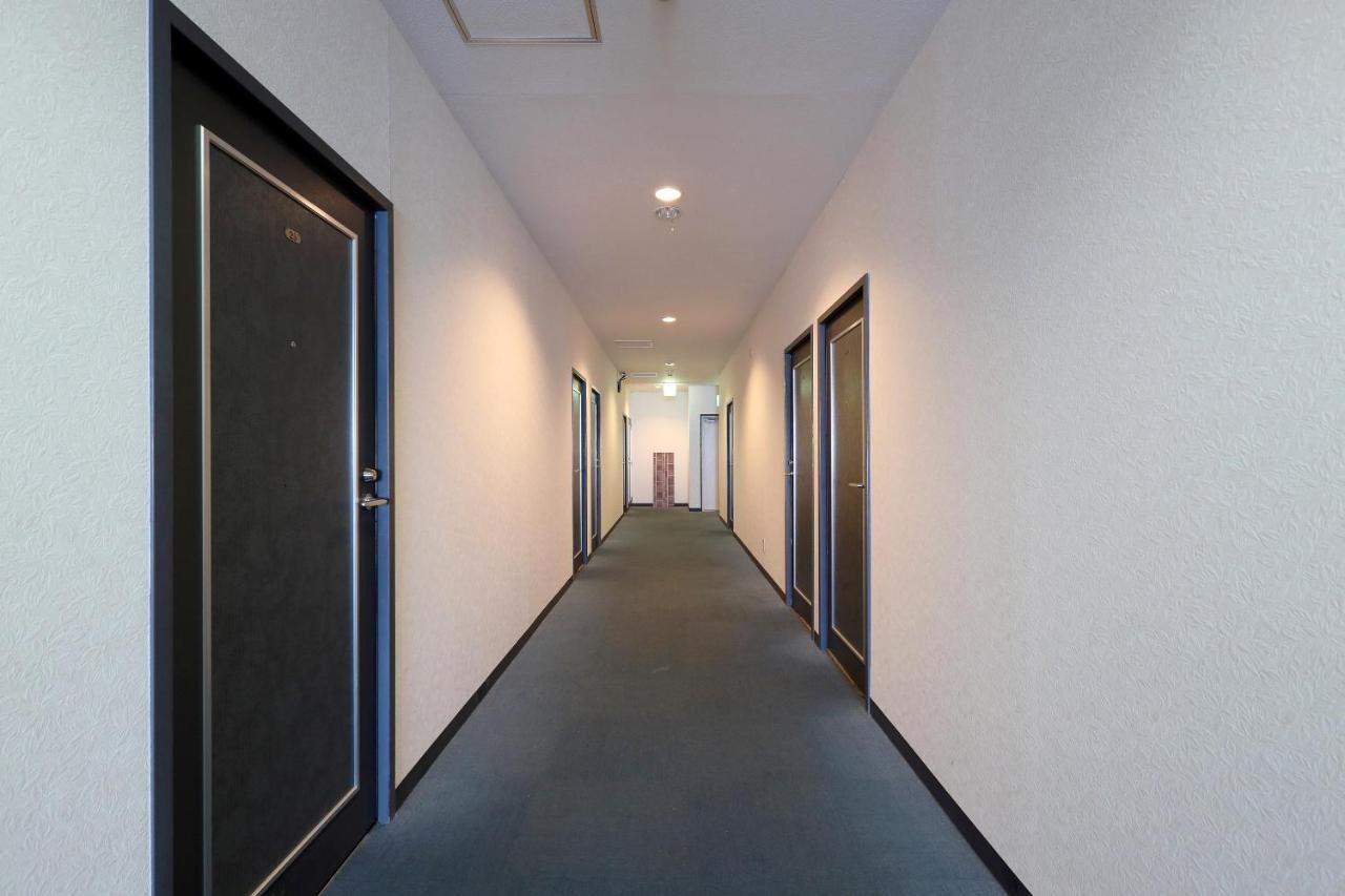 Отель Tabist Izumi Yusen Shukuhaku Center Экстерьер фото