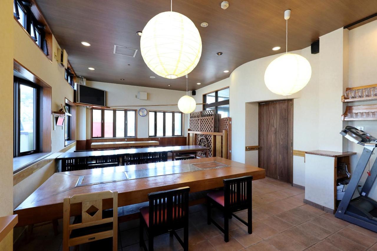 Отель Tabist Izumi Yusen Shukuhaku Center Экстерьер фото