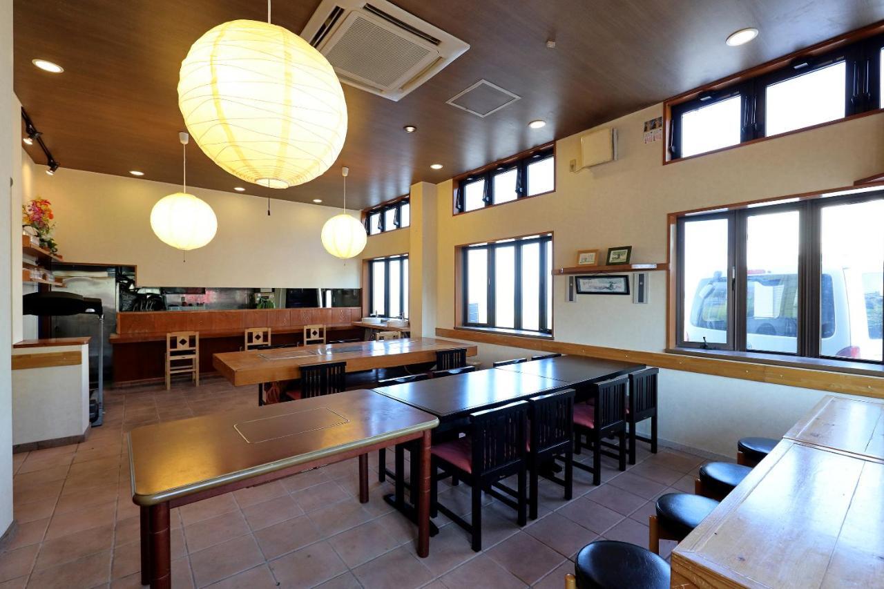 Отель Tabist Izumi Yusen Shukuhaku Center Экстерьер фото