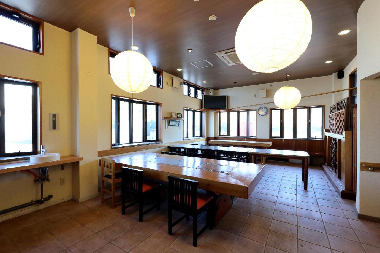 Отель Tabist Izumi Yusen Shukuhaku Center Экстерьер фото